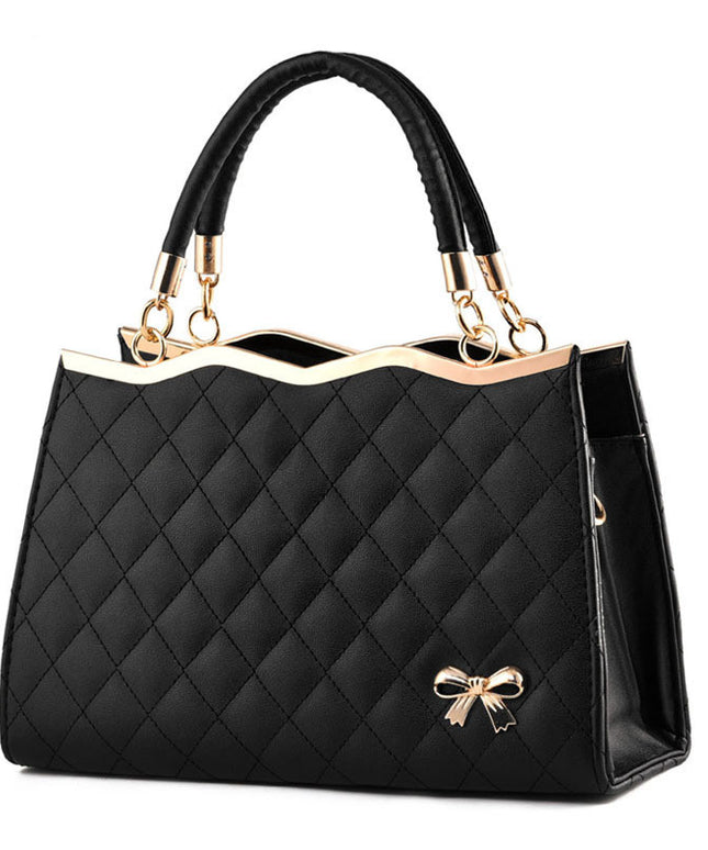 Crossbody shoulder bag with bow